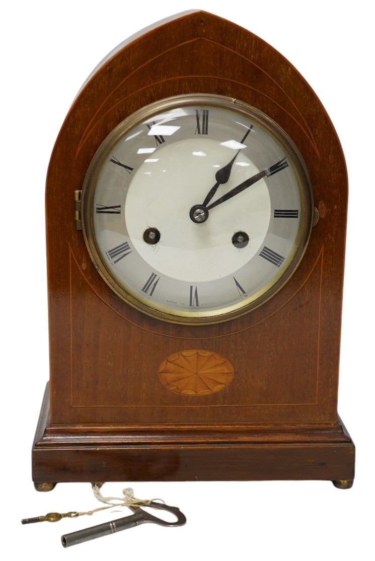 An Edwardian inlaid mahogany eight day lancet topped mantel clock, with key, 31cm high. Condition - fair, untested